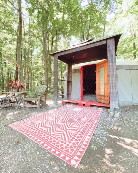 Exterior of Round Mongolian Yurt tent on site. 
