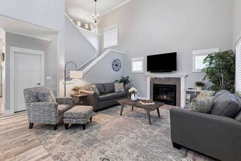 Main Livingroom- Stairs lead to additional rooms and Livingroom. 