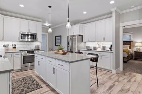 Kitchen- Coffee bar fully stocked with coffee, creamer, sugar and more. 