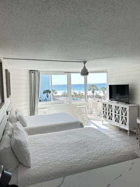 Wake up to unobstructed Gulf views—true beachfront, no roads to cross