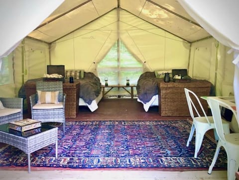 Quad Squad Tent and Breakfast with 2 queen beds, sitting area, table & porch! 
