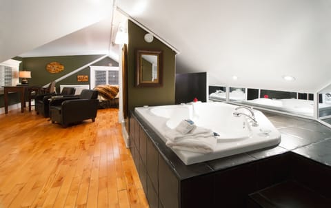 Argentia Suite | Bathroom | Designer toiletries, hair dryer, towels, soap