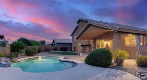 Back yard pool area at night.
