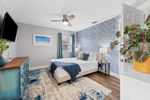 Relaxation redefined in this bright and cozy bedroom designed for your ultimate comfort and peaceful rest.