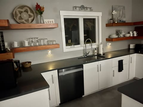 Brand new kitchen with quartz countertops and new appliances