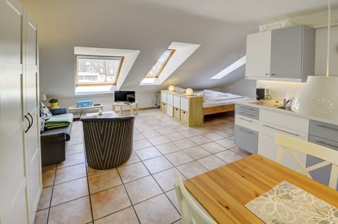 bright living and sleeping area
