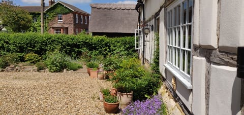 Adjacent to historic listed cottage, large gravel drive private to guests