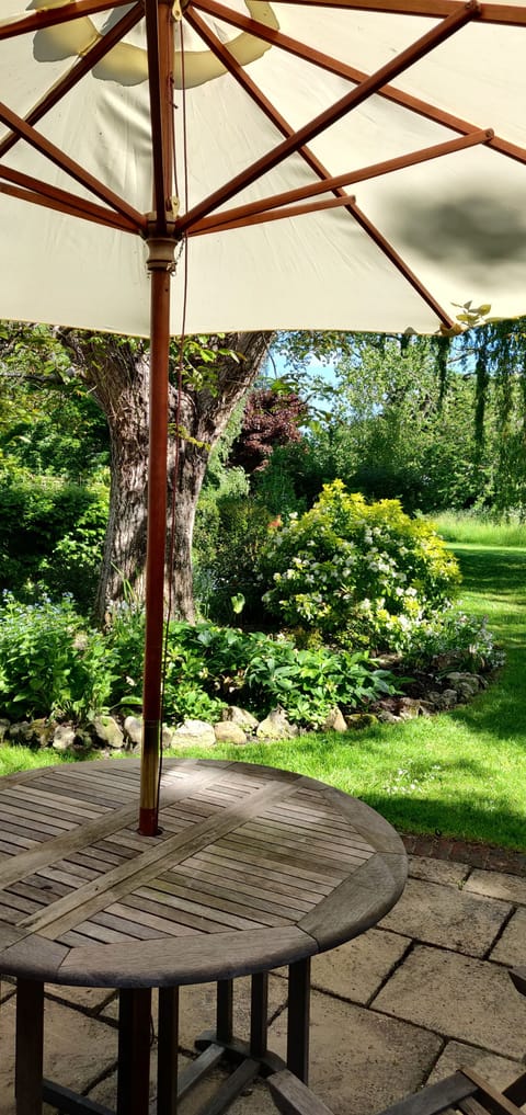 Terrace seating and table, an acre of woodland cottage garden to rear