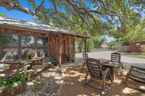 Relax outdoors beneath shady oak trees and take in the rustic beauty of the barn’s exterior.