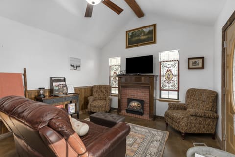 Sink into the leather recliner for a quiet evening by the electric fireplace. This open living space is the ultimate spot to decompress after browsing the shops on Main Street.