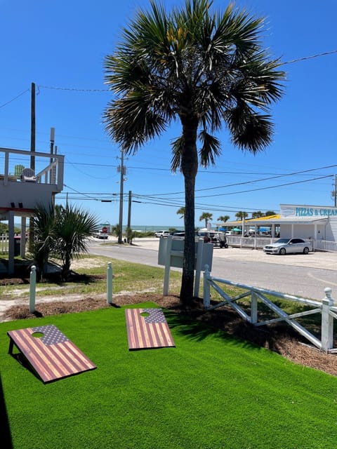 Enjoy cornhole while watching the waves!
BBQ-Dine on front patio.