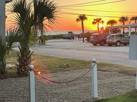 Look at that Sunset view from the cabin's front porch! Thomas Donuts right there