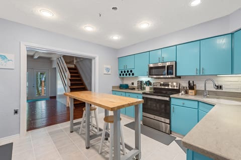 [Kitchen] Fully stocked and equipped for all of your home-cooked meals. Stove, microwave, toaster, and blender.
