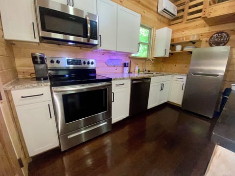 Full kitchen with stainless steel appliances