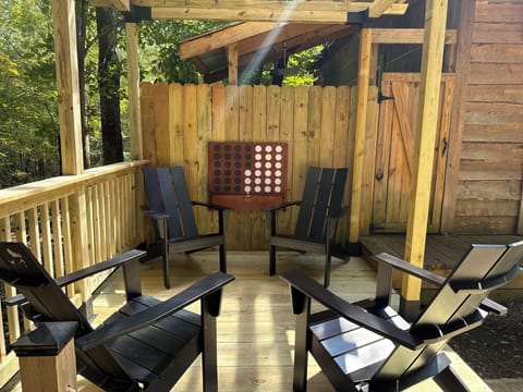 Pergola was built fall 2025. The outdoor shower is behind the connect four game.