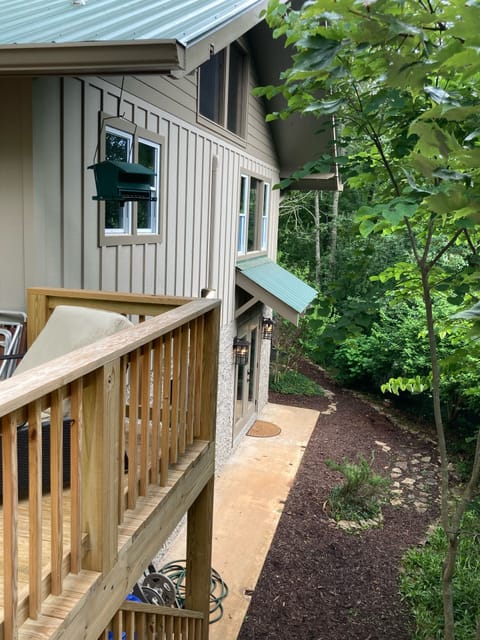 View from the outdoor back deck, looking toward the front door and garden