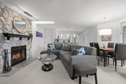 Open & Spacious living area with a sectional sofa perfect for unwinding.