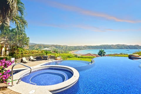 Pool area with great view of the bay and resort, located at the top of the hill.