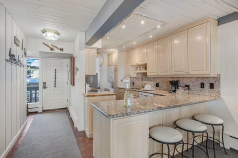 Full kitchen with bar seating