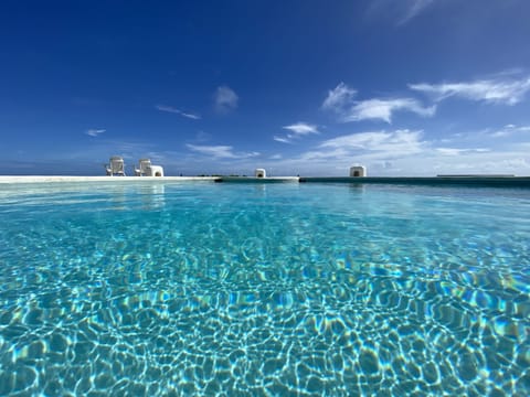Outdoor pool, open 7:30 AM to 8:00 PM, sun loungers