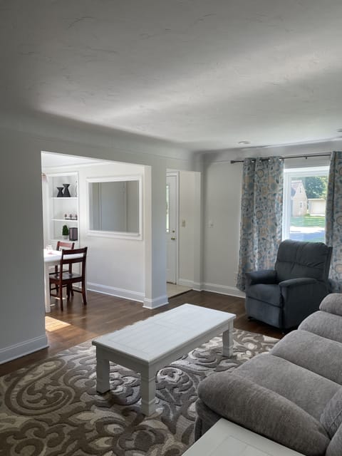 Living room - The living room flows naturally into the dining area and kitchen