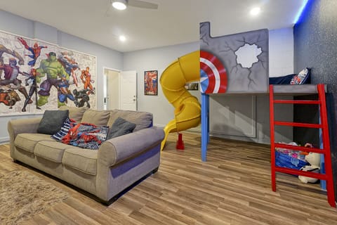 Playroom with slide, fort, tv, arcade games, and more!
