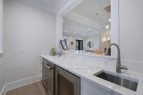 BUILT IN BAR W/WINE AND BEVERAGE FRIDGE