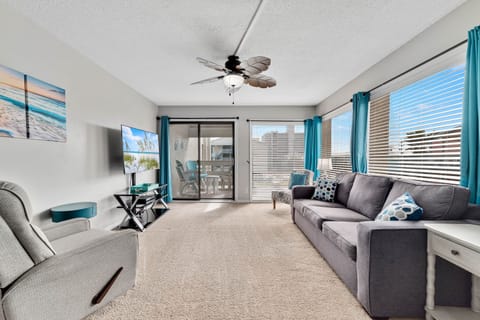 Living room with big windows for a lot of natural lighting 