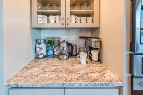 Coffee bar with Kuerig, tea kettle, and complimentary k-cups for the whole stay.