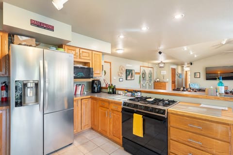 View of the main level kitchen area facing toward the main living area.