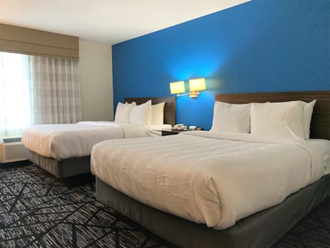 Desk, laptop workspace, iron/ironing board, travel crib