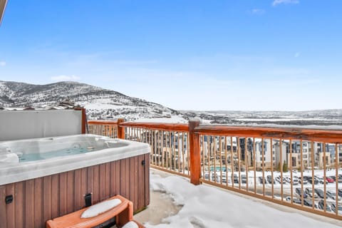 Private hot tub with mountain views.