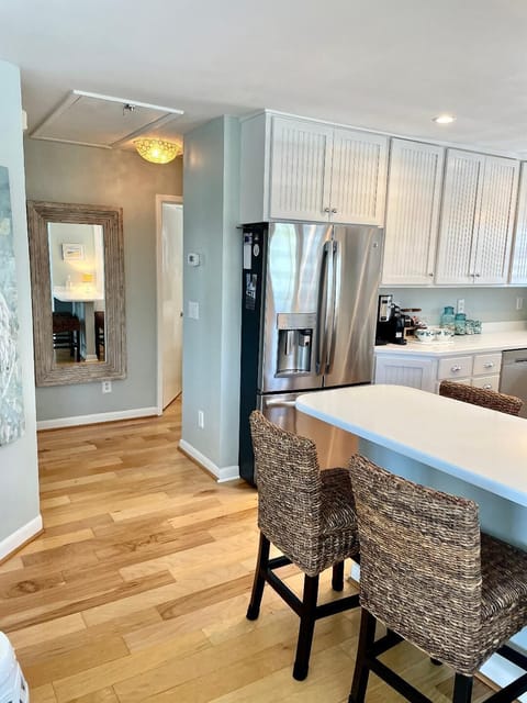 View of kitchen and hallway to bedrooms