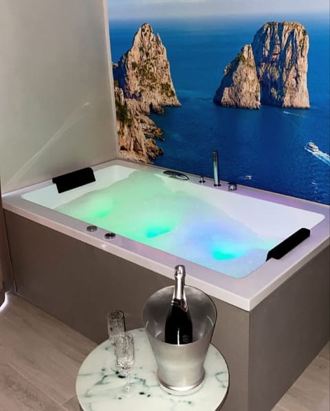 Luxury Room, Jetted Tub | Minibar, in-room safe, desk, blackout drapes