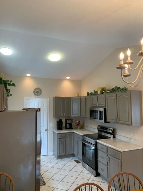 Full Kitchen with stainless steel appliances 