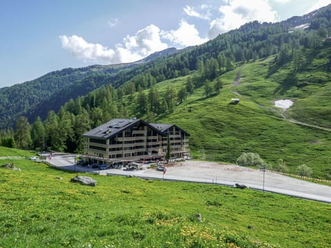 Sky, Mountain, Cloud, Plant, Natural Landscape, Slope, Land Lot, Tree, House, Grass