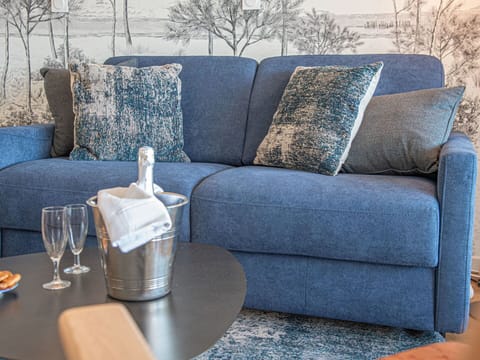 Furniture, Table, Property, Couch, Blue, Tableware, Azure, Rectangle, Comfort, Interior Design