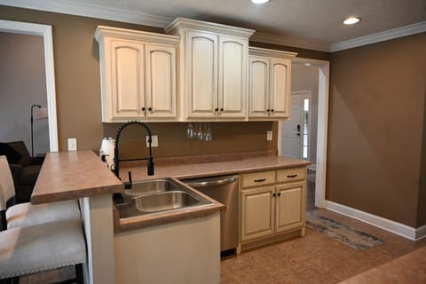 Fully stocked kitchen with stainless steel appliances