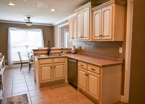 Fully stocked kitchen with stainless steel appliances