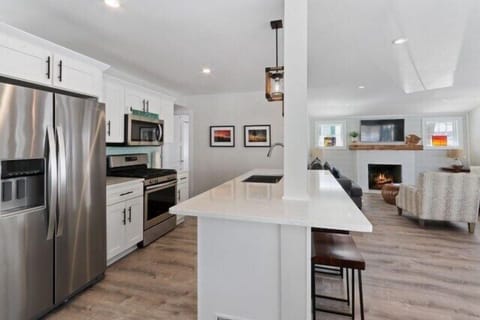 Open kitchen, gas stove, drip coffee maker