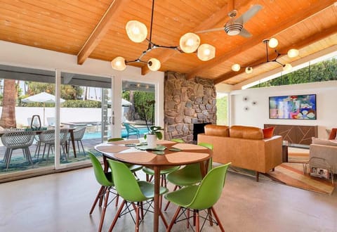 Great room with polished concrete floors, hand-laid stone fireplace