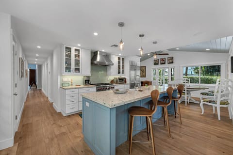 Sub Zero and Wolf appliances appoint the  center of activity and great room.