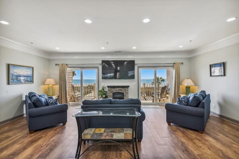 Enjoy this oceanfront living room with your friends and family.