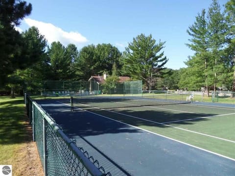 Summer access to tennis courts at Pinebrook Condos on M-88