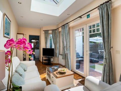 Furniture, Property, Couch, Picture Frame, Table, Comfort, Azure, Living Room, Interior Design, Textile