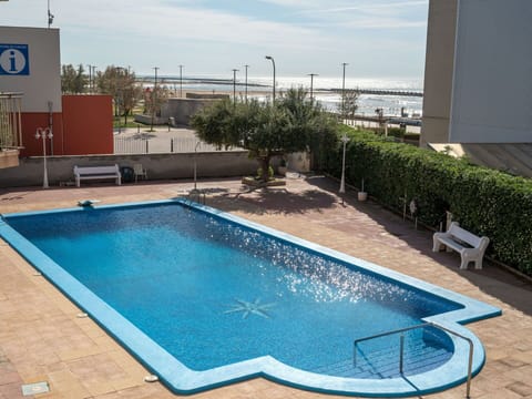 Water, Plant, Property, Swimming Pool, Sky, Building, Azure, Shade, Rectangle, Outdoor Furniture
