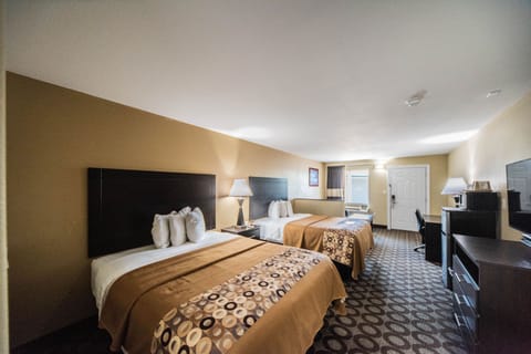 Suite, 2 Queen Beds, Non Smoking, No Pets | Premium bedding, desk, iron/ironing board, cribs/infant beds