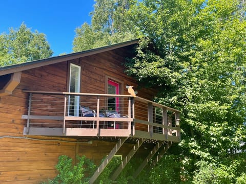 Front of the Property. Just look for the Raven! 
