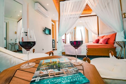 Honeymoon Double Room | Living area | 22-inch LED TV with satellite channels, TV