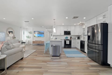 Open living area seamlessly connects to the kitchen